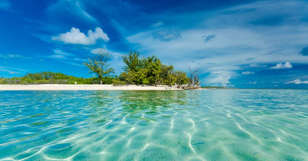 Crystal-clear water near remote island in the Bahamas