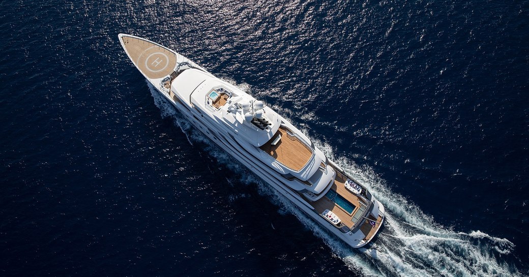 superyacht MADSUMMER by lurssen shipyard underway as she cruises deep waters on her charter through the Caribbean 