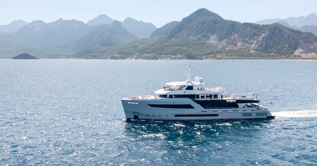 Bering explorer yacht HEEUS cruising in blue waters