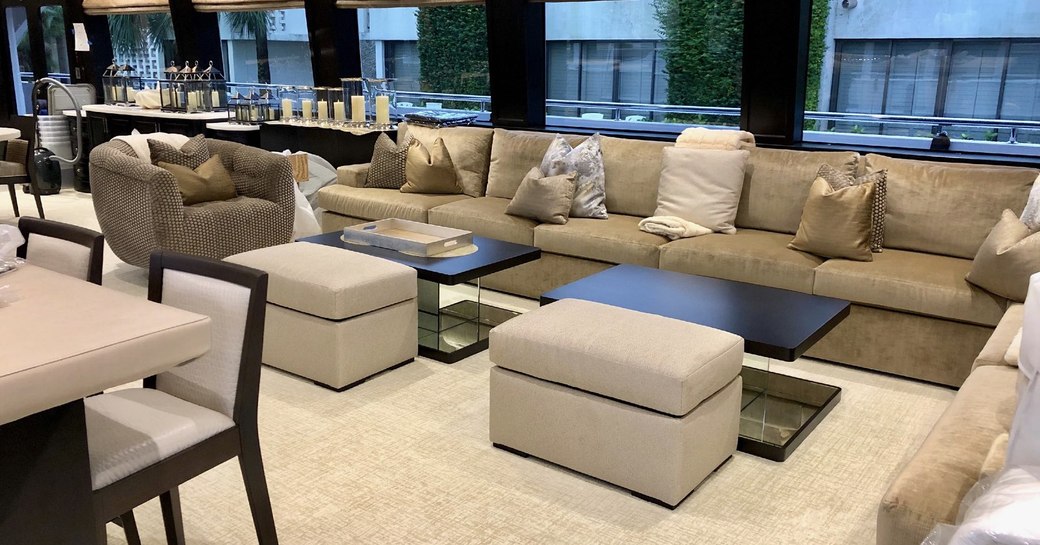 large sofa in the main salon of charter yacht TANZANITE 