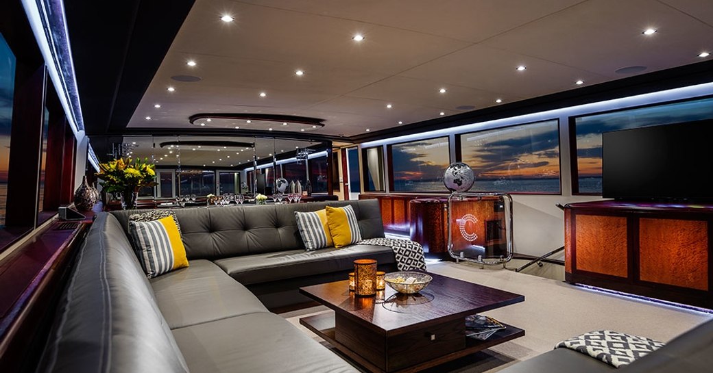 large sofa in main salon of motor yacht CORROBOREE 