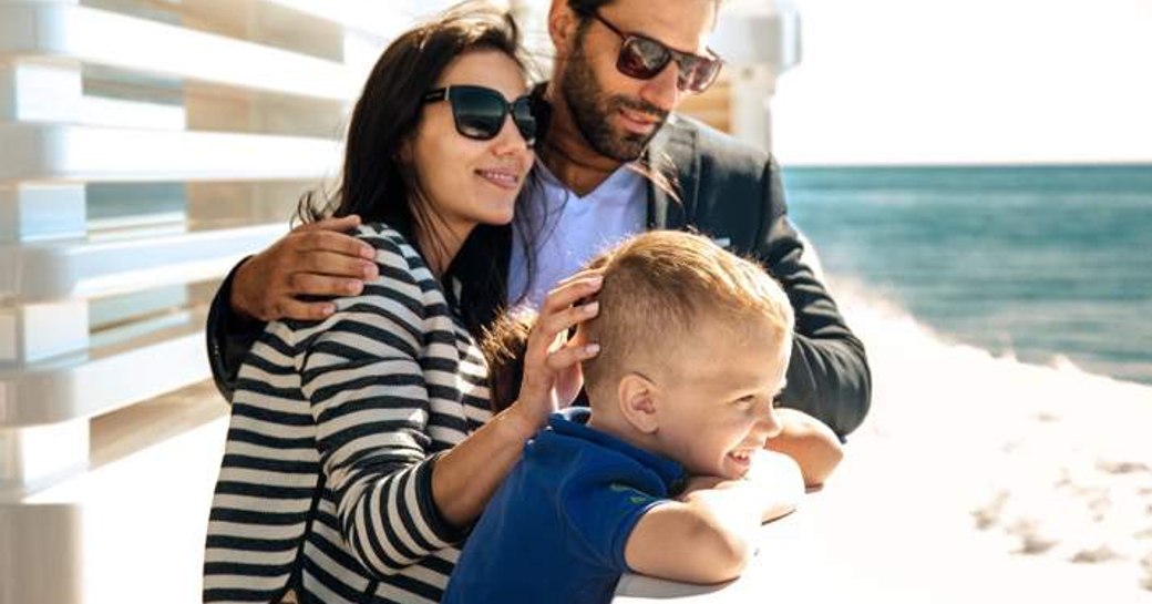 family close to the water on a yacht charter vacation