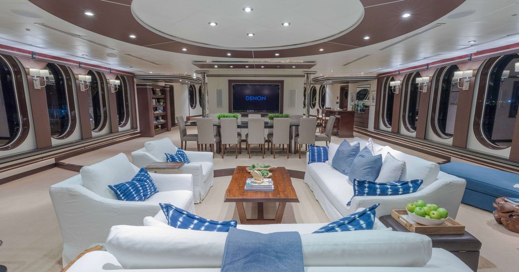 seating area and dining table in the skylounge aboard expedition yacht GLOBAL 