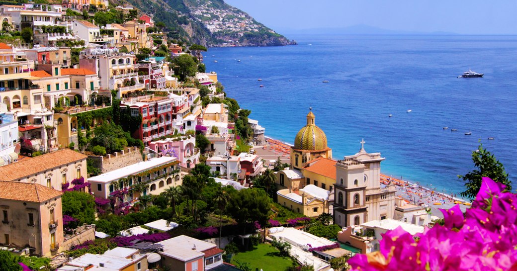 amalfi coast view over positano, with sea in background