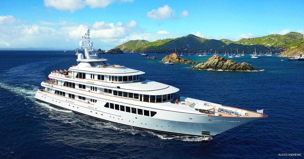 headship superyacht utopia underway in the caribbean, island of st barts in the background