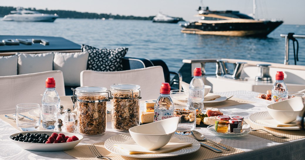 Table set for breakfast on the aft of Lady Amanda