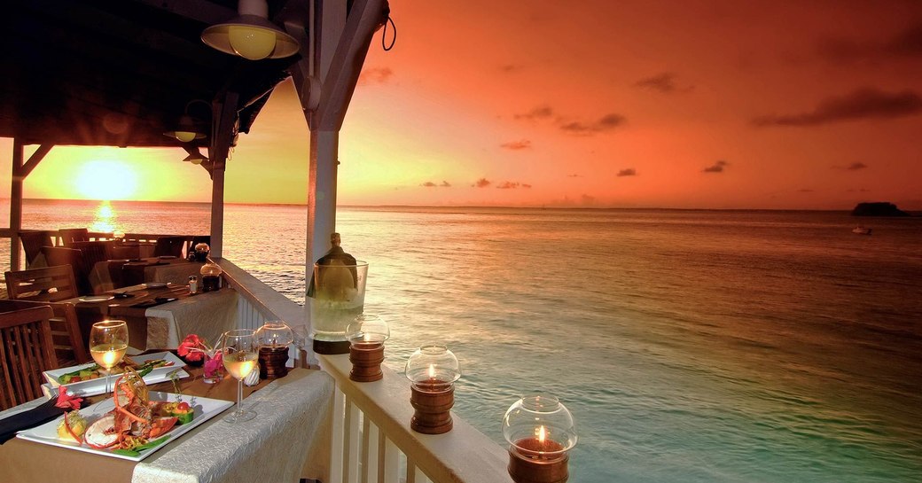 Sundowners at Grand Case beach in St Martin, Caribbean