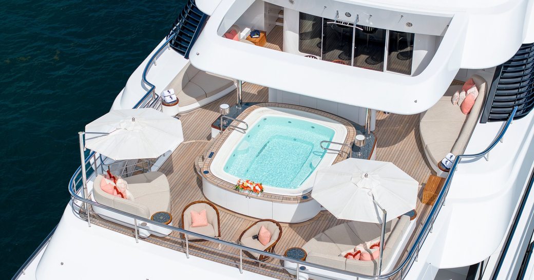 Overhead view looking down on deck Jacuzzi onboard superyacht charter GIGIA