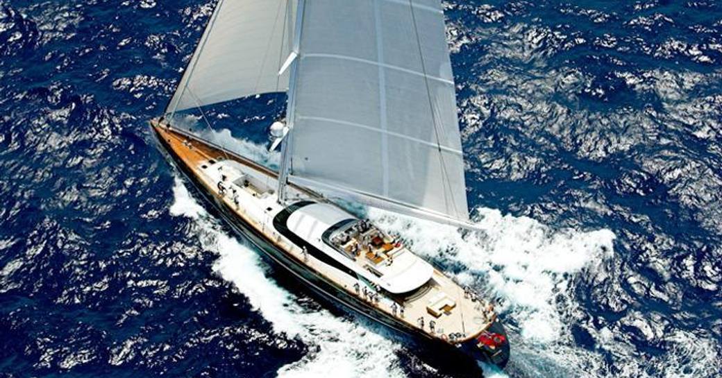 Aerial, overhead view looking down on charter S/Y PRANA underway, surrounded by sea