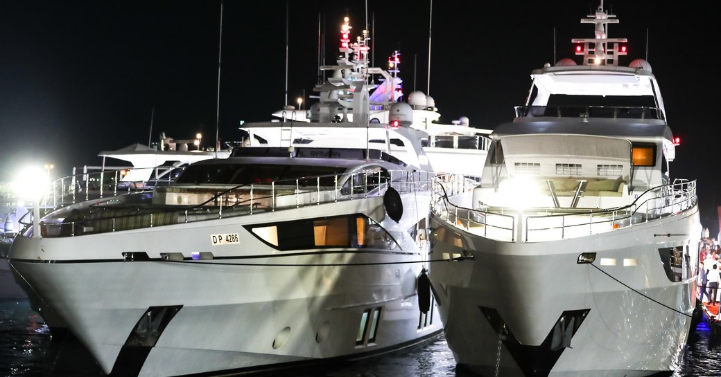 Two images taken from the bow at night during the Dubai International Boat Show 2018