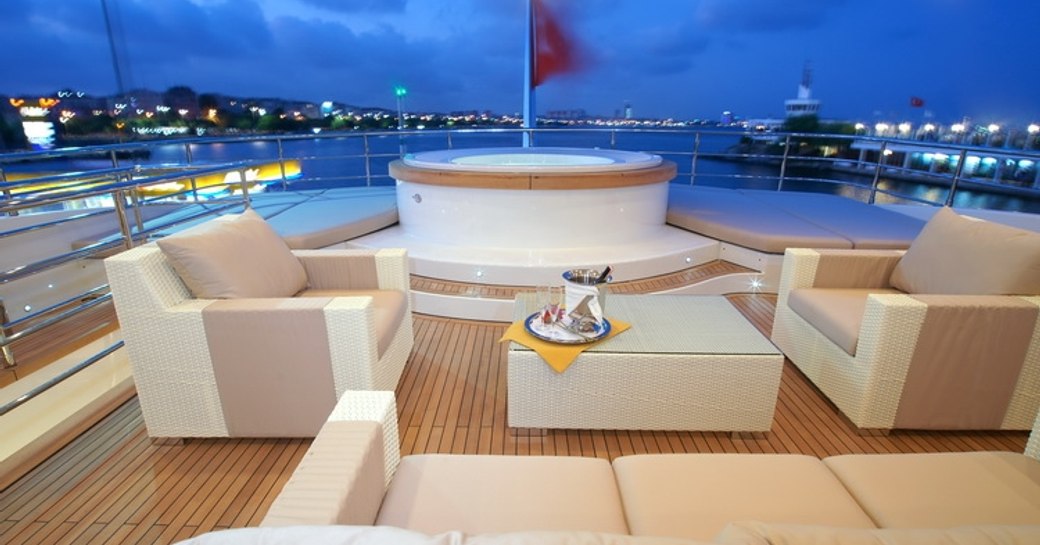 superyacht TATIANA's deck jacuzzi and sofa's