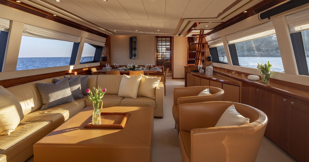 sofa and armchairs in the main salon aboard superyacht ASTARTE 