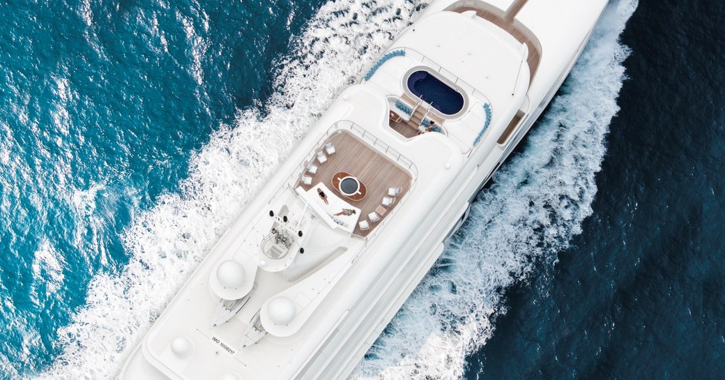 pool and seating area on the top deck of charter yacht Lady E