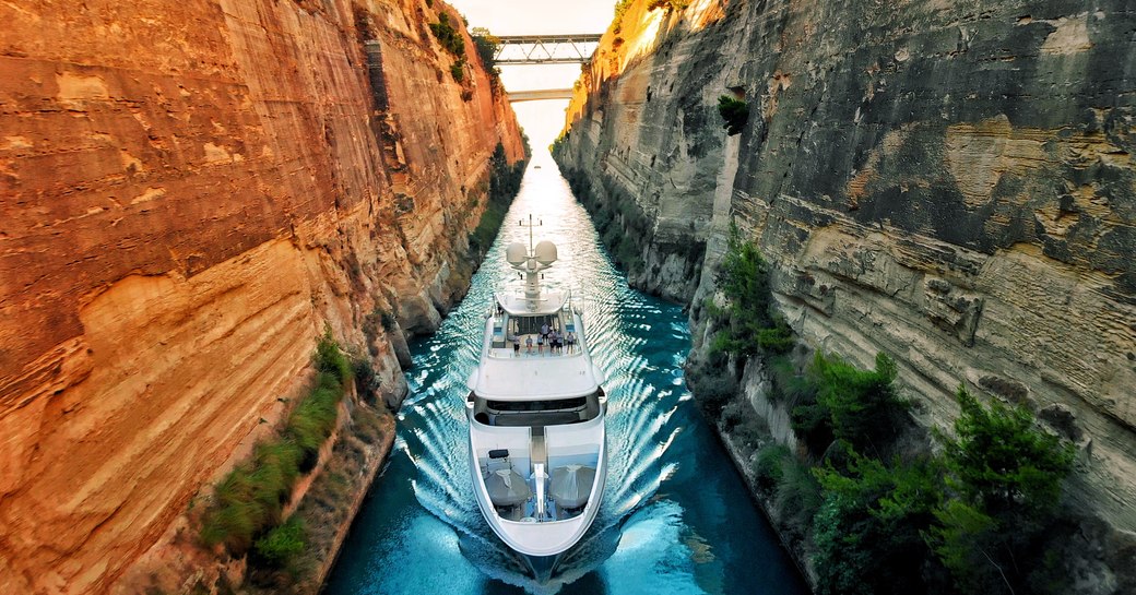 superyacht glides up corinth canal