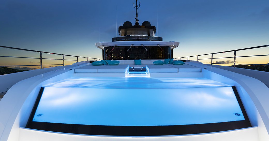 the infinity pool on-bard superyacht EVA. 4EVA BUILT WITH MOOD LIGHTING AND LOCATED ON HER FORWARD DECK