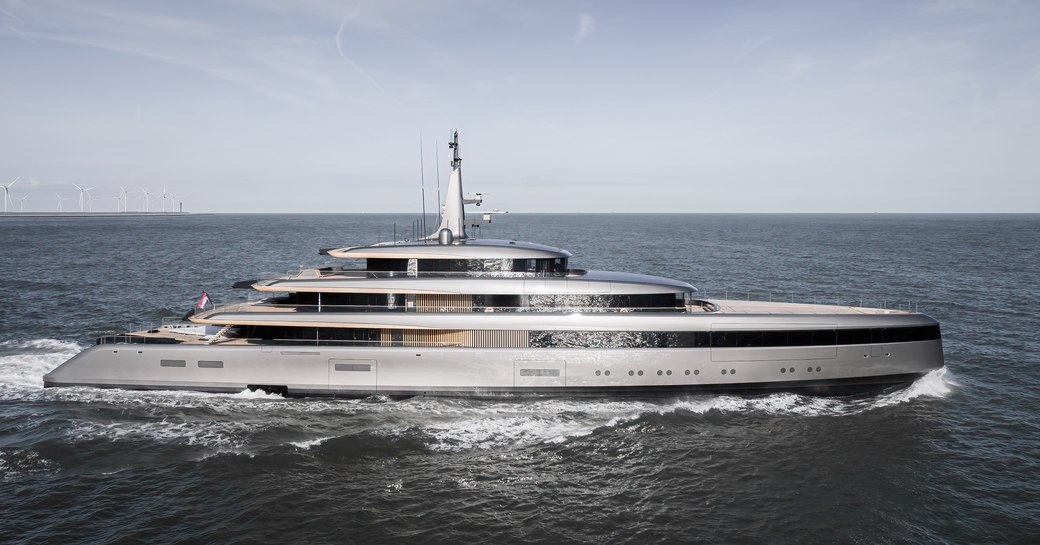 Side view of superyacht OBSIDIAN underway, surrounded by sea.