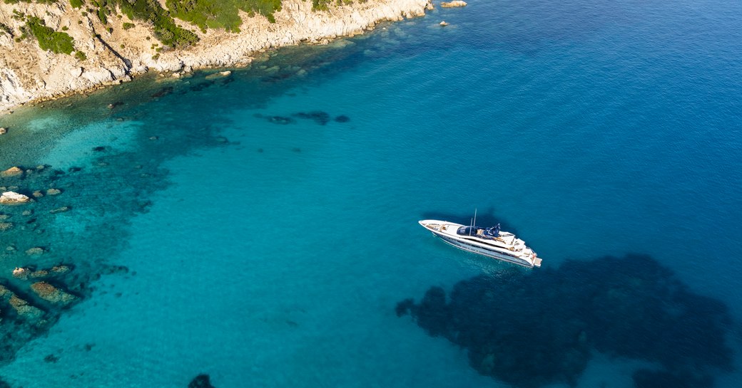 heesen superyacht irisha on the water near coast of sardinia