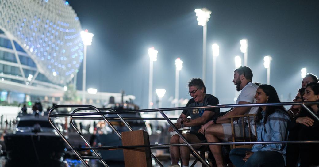 People watch the F1 from a yacht during the Abu Dhabi Grand Prix