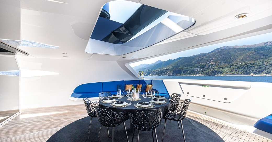 outdoor dining onboard luxury superyacht charter