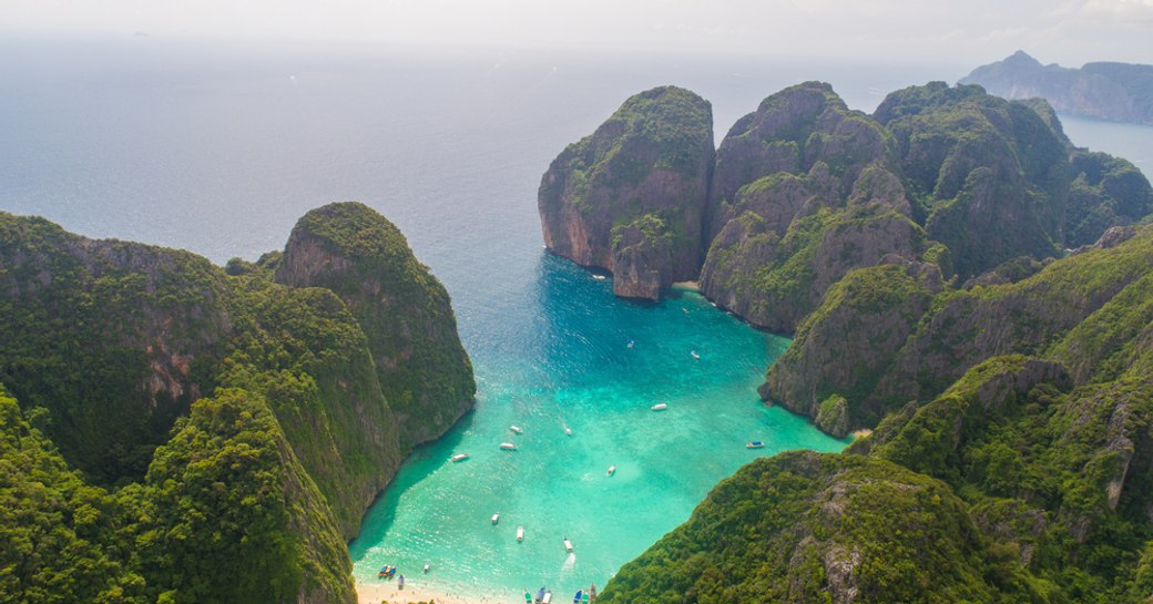 phi phi islands in thailand, emerald bay and lush forests 