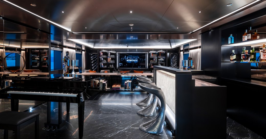 bar area and piano on board motor yacht solo