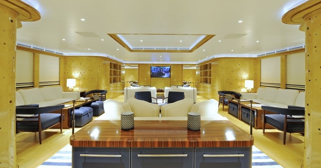 polka dotted maple walls in main salon aboard motor yacht TV