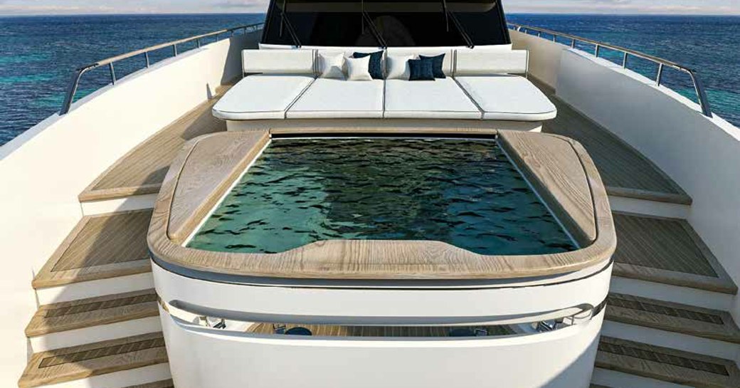 Forward pool and loungers onboard MY Koju