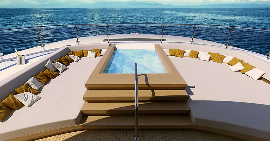 pool surrounded by sunpads on board luxury yacht Illusion Plus