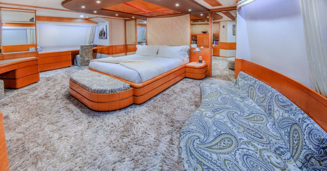 spacious master stateroom with ensuit bathroom inside luxury charter yacht Island heiress 