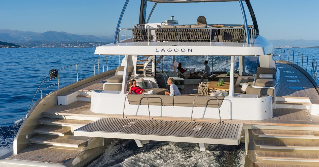 Social seating area al fresco on the deck of luxury yacht Double Down