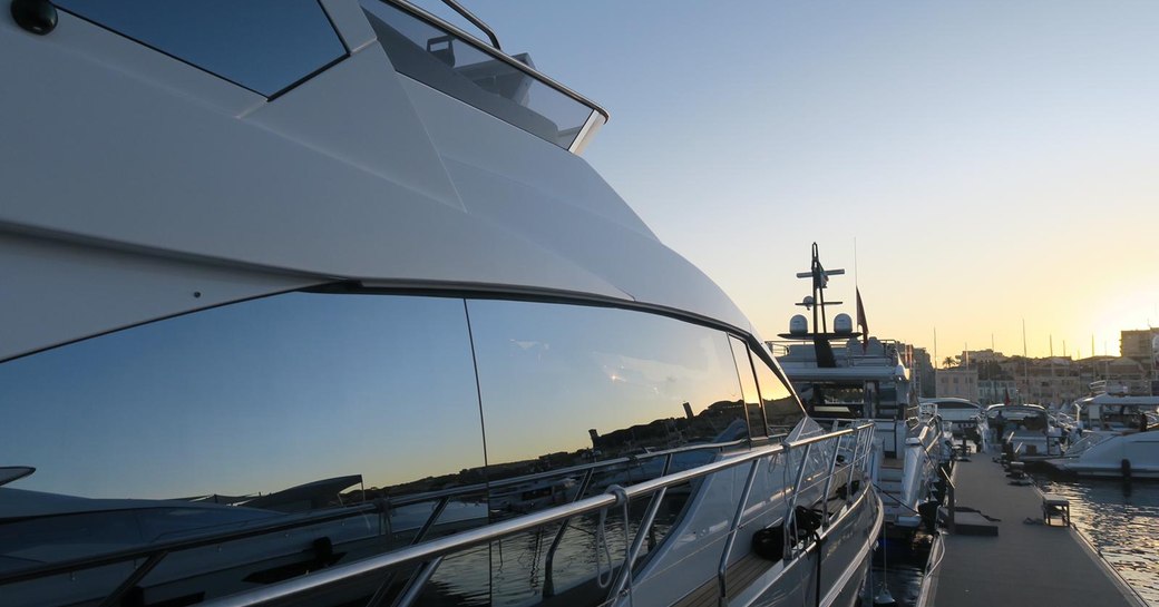 Yachts at sunset during the Cannes Yachting Festival 