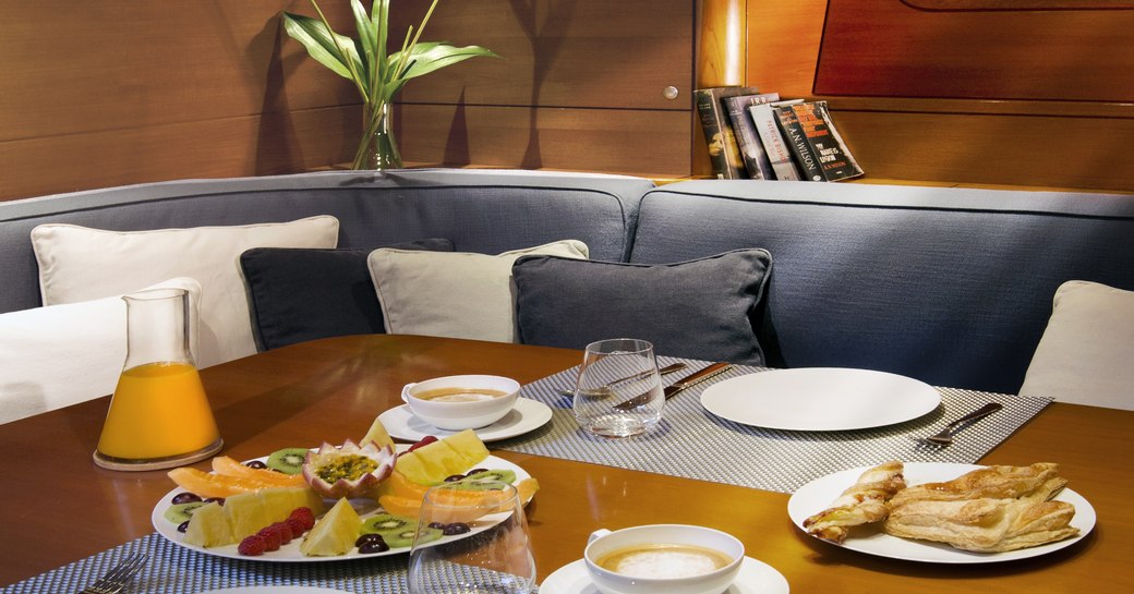 close up of breakfast served in main salon of luxury yacht MUZUNI 