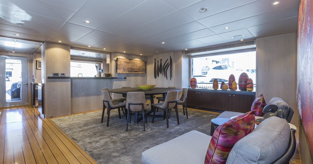 The modern furnishings which compose the interior of superyacht AKIKO