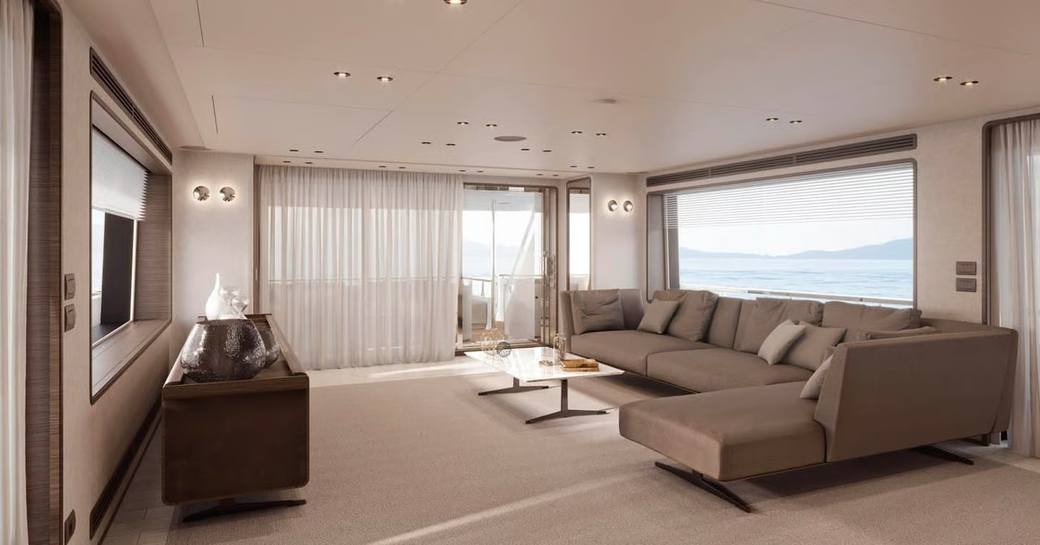 Main salon sofas and large window onboard charter yacht TWINS