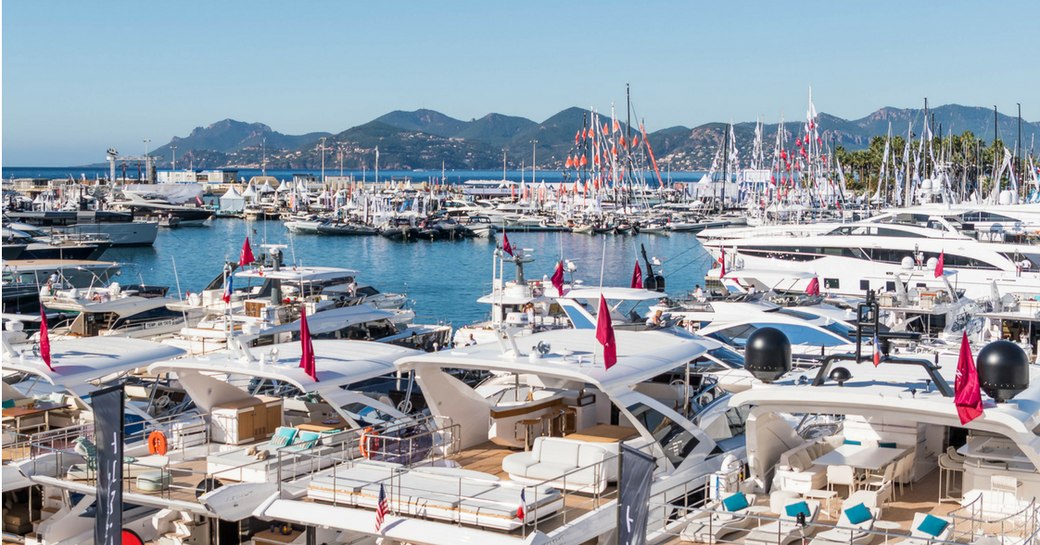 luxury yachts lined up in Vieux Port for the Cannes Yachting Festival 