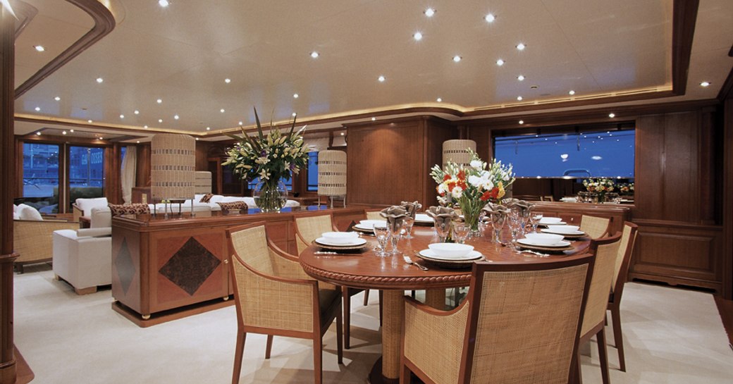 formal dining area in main salon of charter yacht JO