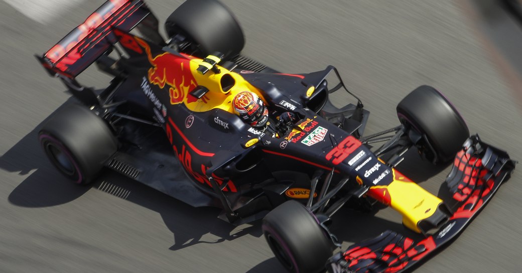 motor car whizzes around the track at the monaco grand prix