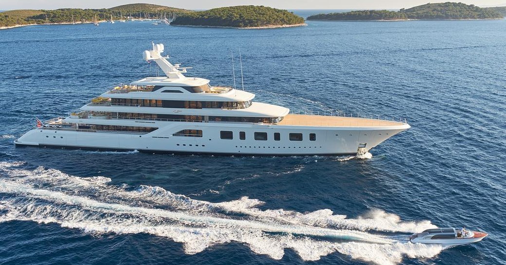 the luxurious superyacht Aquarius underway in the Caribbean on her luxury yacht charter