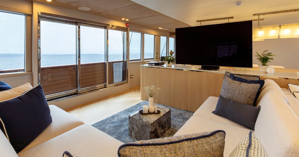 Interior lounge area onboard charter yacht SCORPIOS