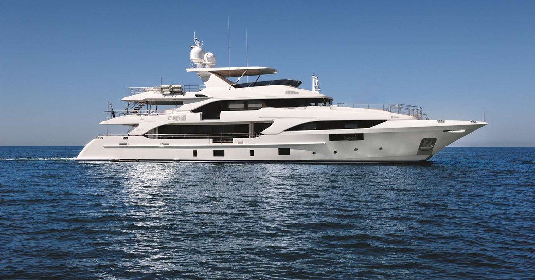 superyacht happy me by benetti underway in the mediterranean hitting popular hotspots such as the amalfi coast and the french riviera 