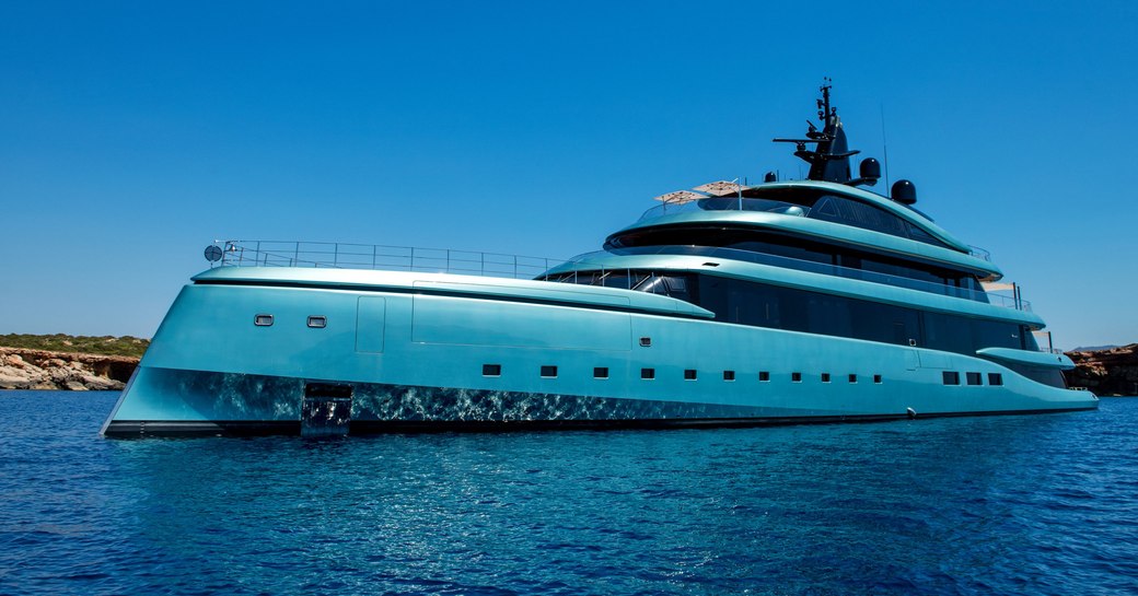 Charter yacht KENSHO at anchor, surrounded by sea.