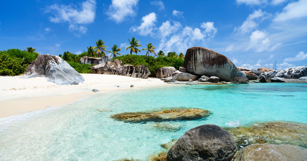 Boulders on the sandy beach in the British Virgin Islands