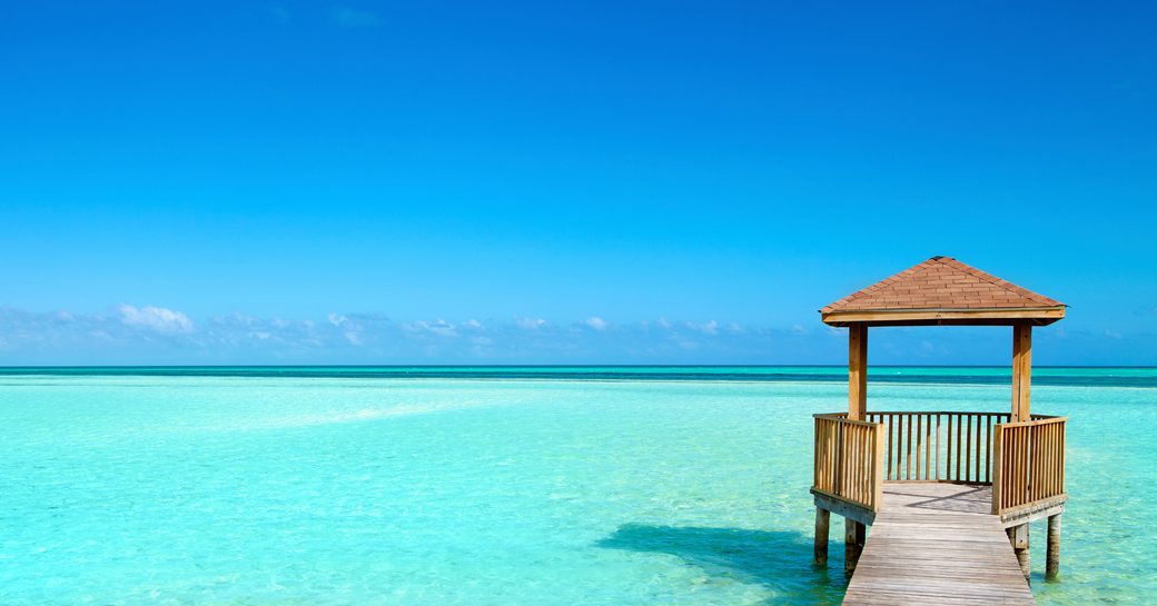 A pier over turquoise waters in Bahamas