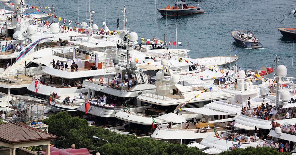 yachts in zone A in Port Hercules decked out in bunting for the Monaco Grand Prix