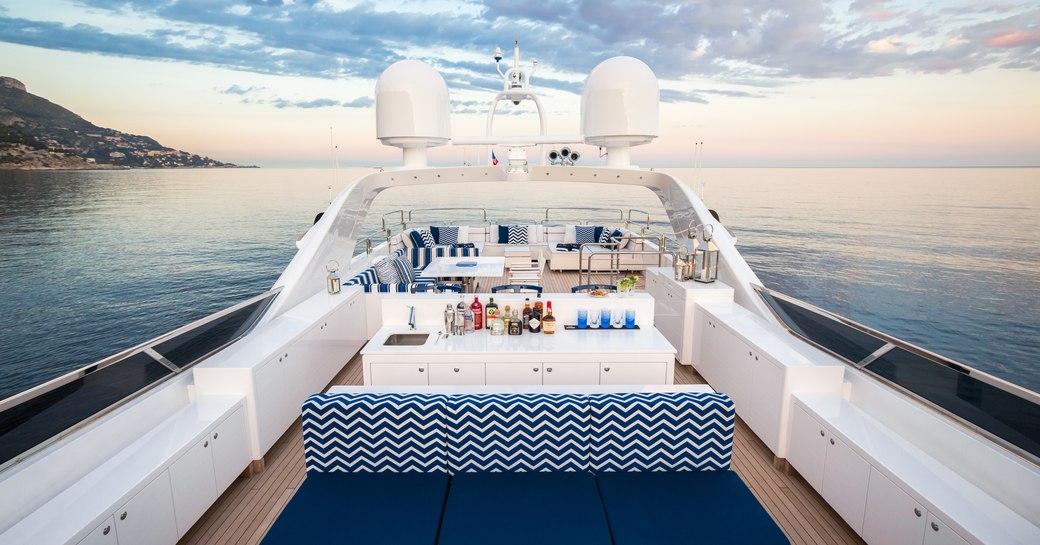 seating and bar areas on sundeck of motor yacht Da Vinci 