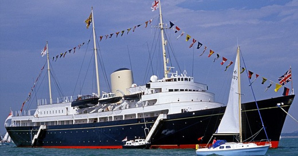 HMY Britannia surrounded by sailing yachts and tenders