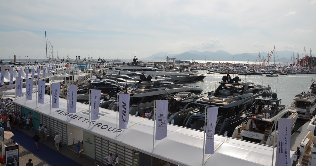 Luxury yachts lined up along the marina in cannes