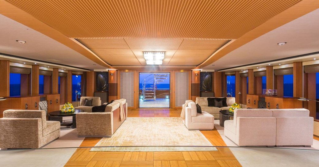 seating areas in the large main salon aboard luxury yacht WHEELS