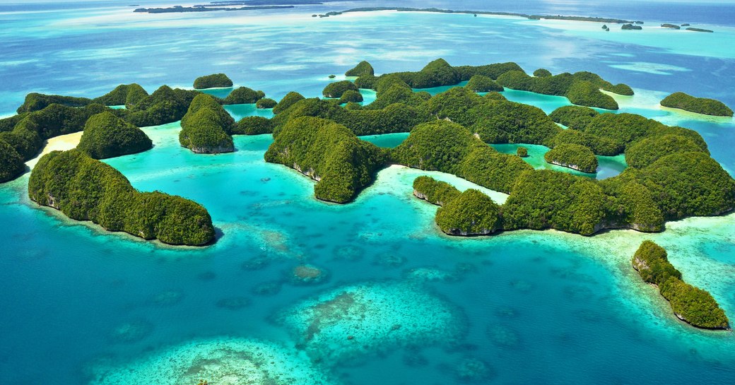 south pacific islands with bright blue sea and sandy beaches