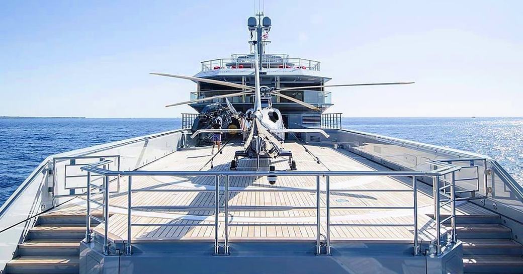 Helicopter on the aft deck of charter yacht BOLD